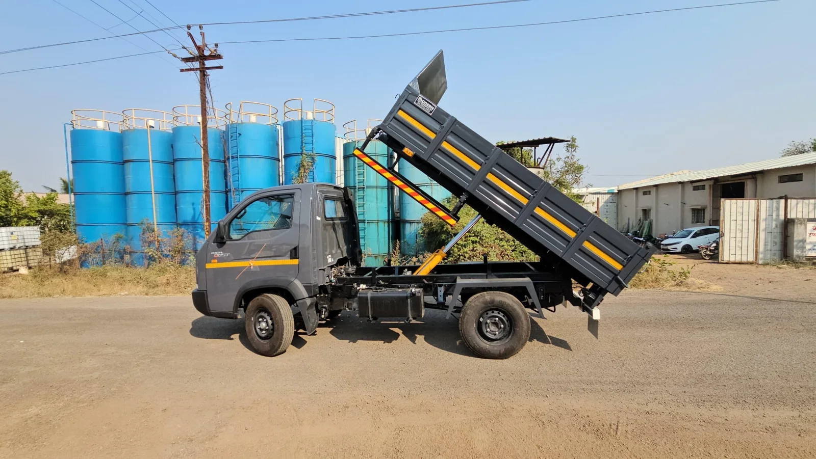 Tipper truck body shown raised